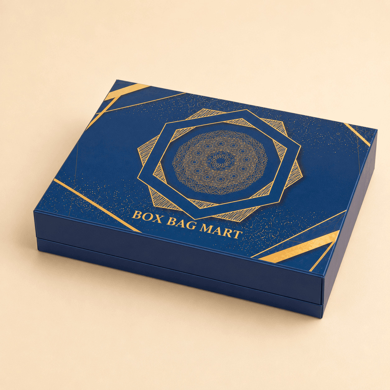 BOX BAG MART royal blue and gold custom-printed luxury sweet and dry-fruit packaging box with assorted mithai compartments.