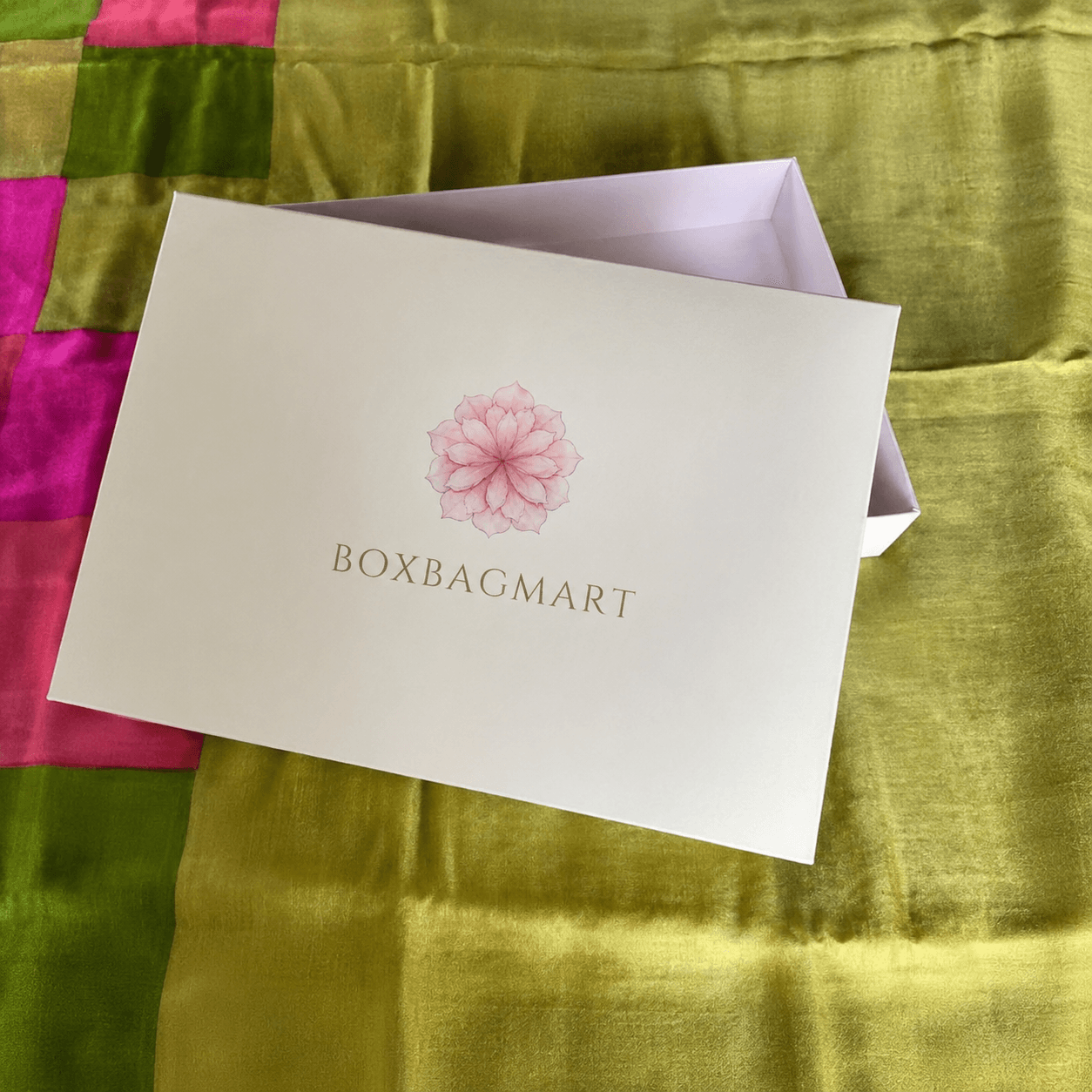 White custom printed premium saree and garment duplex packaging box with floral design and BOXBAGMART branding